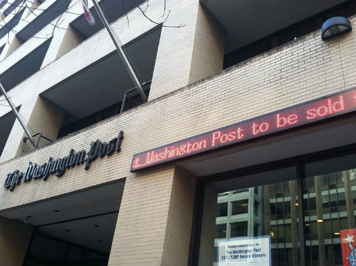 The Washington Post headquarters Aug. 5, featuring ticker announcing its own sale to Amazon founder Jeff Bezos. Photo by Adam Glanzman and used here with a Creative Commons license.